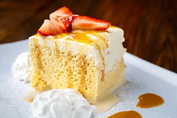 Moist tres leches cake dessert from El Fogón Taquería.